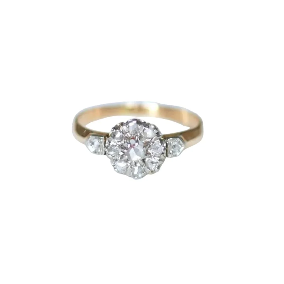 Bague Marguerite en or rose, platine, et diamants