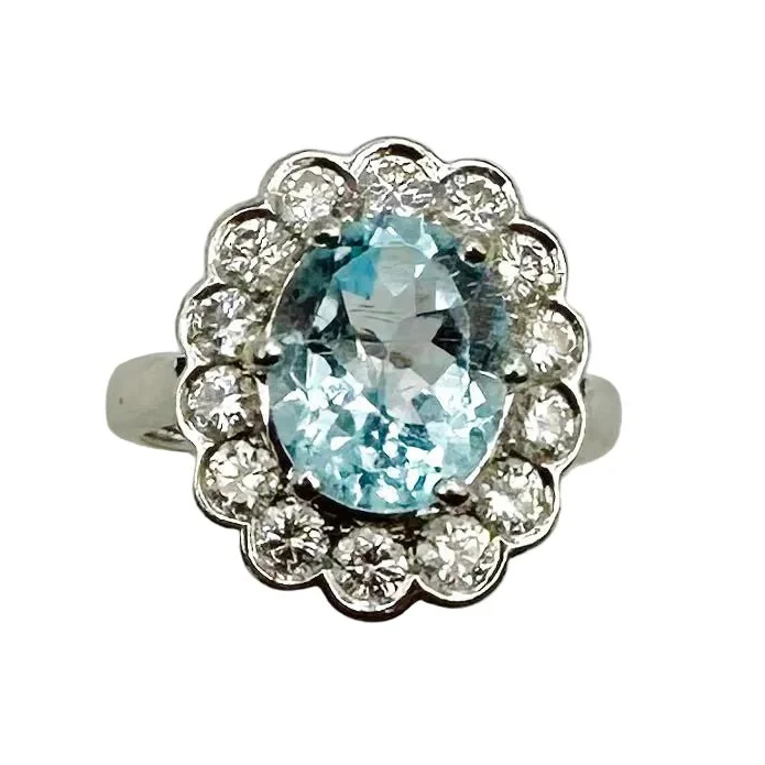 Bague Marguerite en or blanc, aigue-marine et diamants