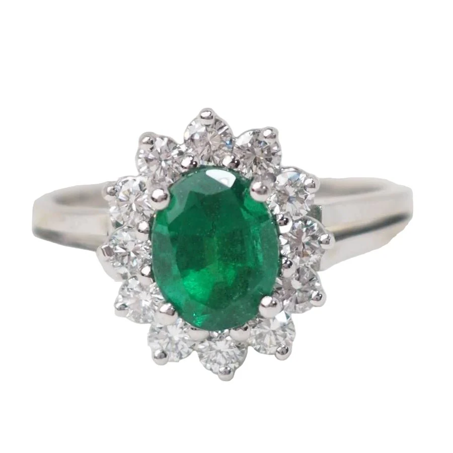 Bague marguerite en or blanc émeraude et diamants