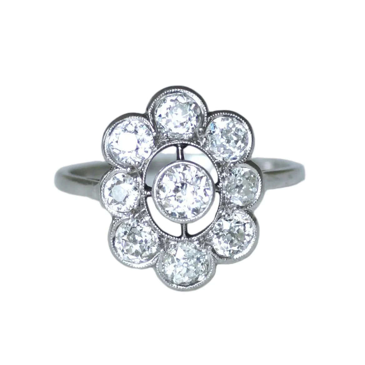 Bague Marguerite en or blanc, platine et diamants