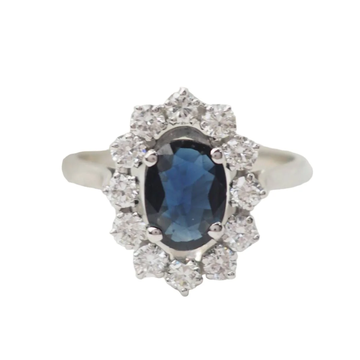 Bague marguerite en or blanc, saphir et diamants