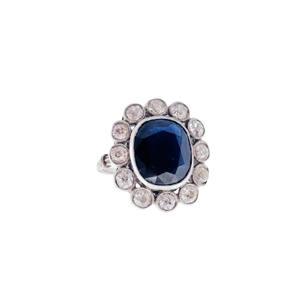 Bague Marguerite en platine, or blanc, saphir et diamants