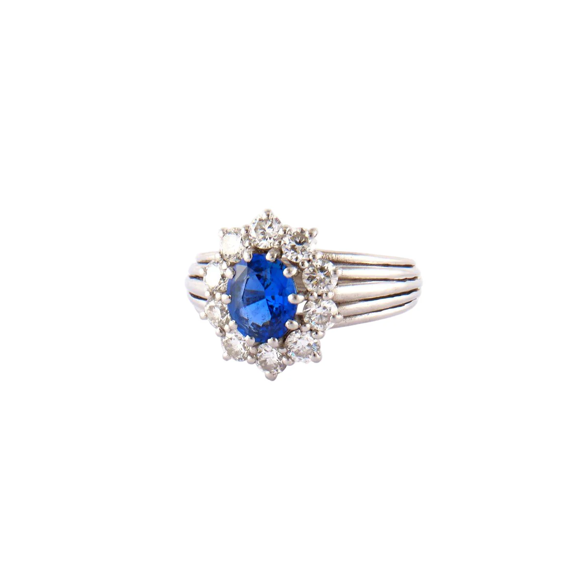Bague Marguerite en platine, saphir et diamants