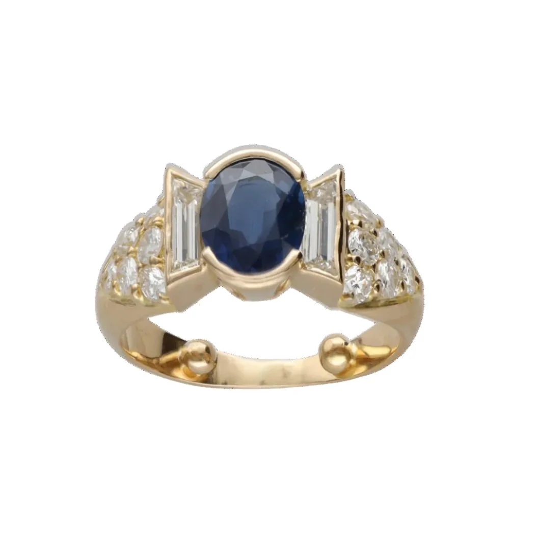 Bague Solitaire en or jaune, saphir et diamants