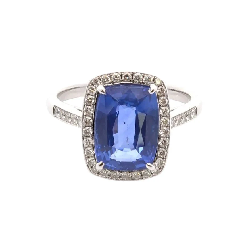 Bague Entourage en or blanc, saphir et diamants