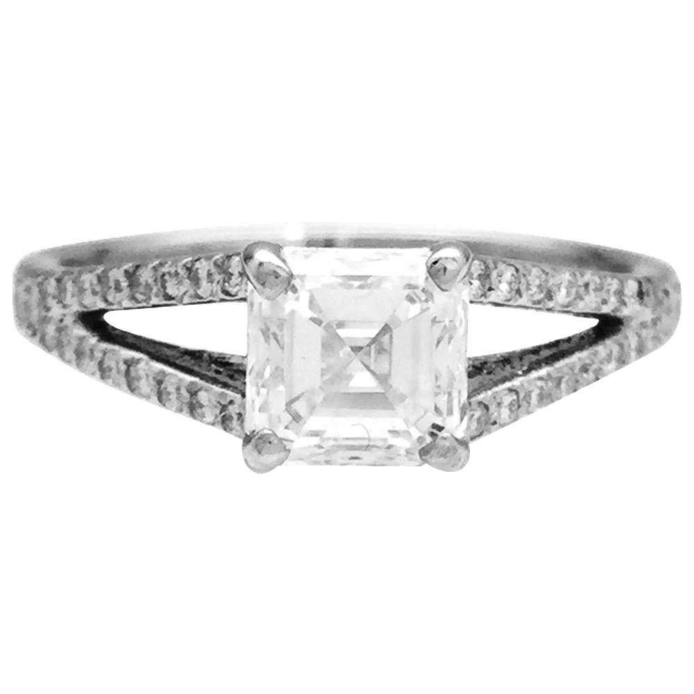 Bague solitaire 1 carat E/VS1 en or blanc et diamants