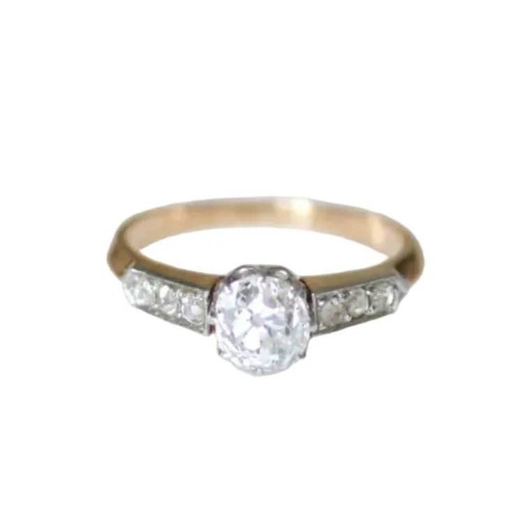 Bague Solitaire en or rose, platine et diamants