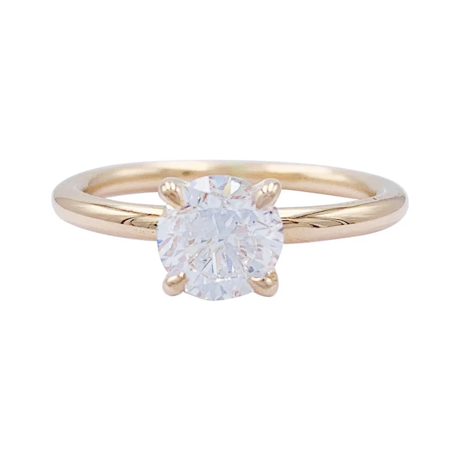 Bague solitaire en or blanc, diamant 1 carat