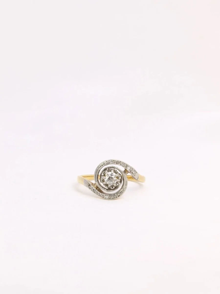 Bague tourbillon or platine diamants taille ancienne 0,10 ct