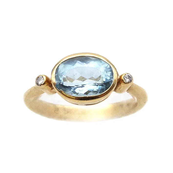 Bague Trilogie en or jaune, aigue-marine et diamants
