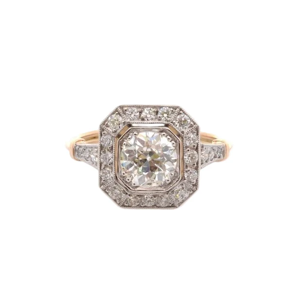 Bague Entourage en platine, or jaune, et diamants