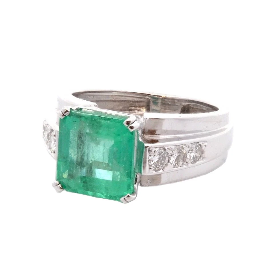 Bague Solitaire en platine, émeraude, et diamants