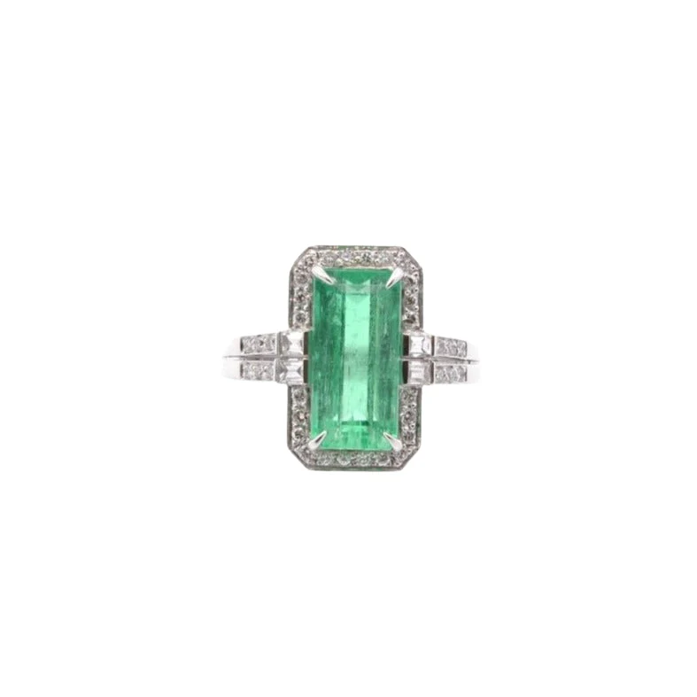 Bague vintage émeraude et diamants en platine