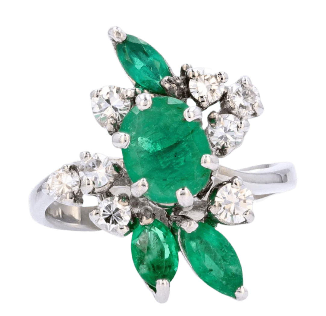 Bague Cocktail en or blanc, émeraudes et diamants