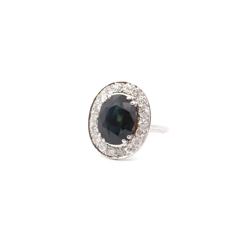 Bague Entourage en or blanc, saphir et diamants