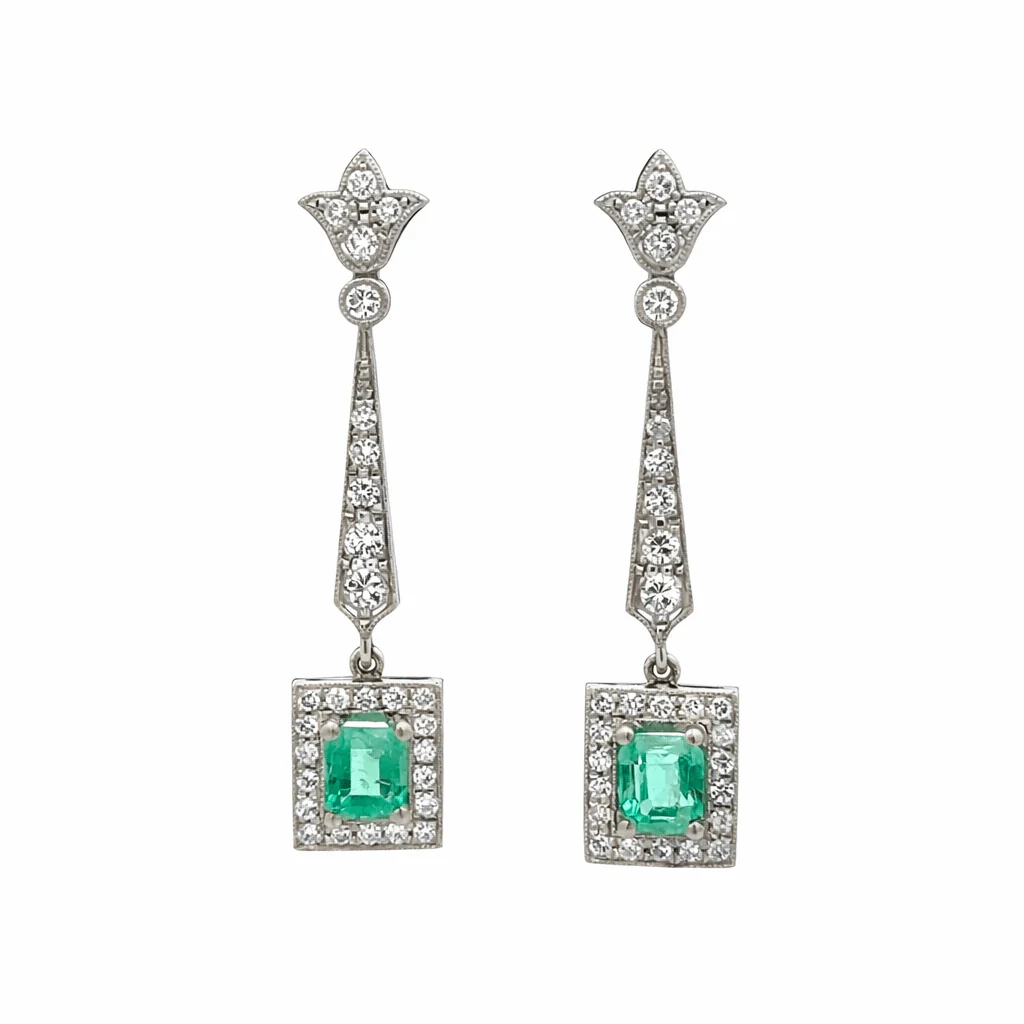 Boucles d'oreilles Pendantes en platine, émeraudes et diamants