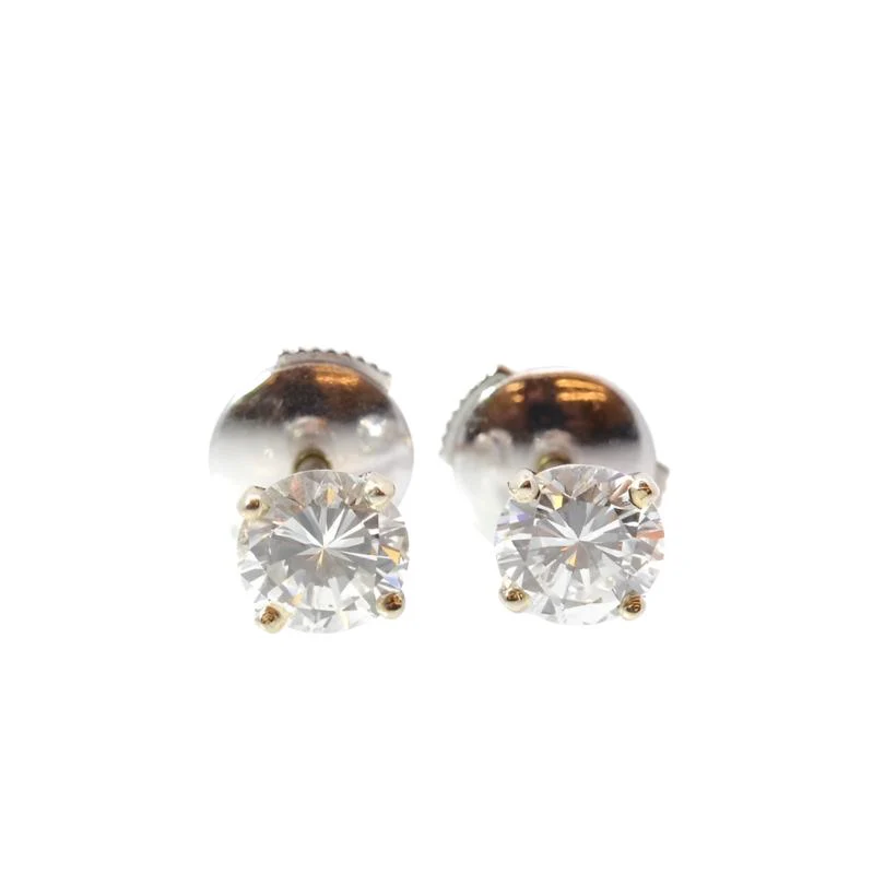Boucles d'oreilles puces en or blanc et diamants