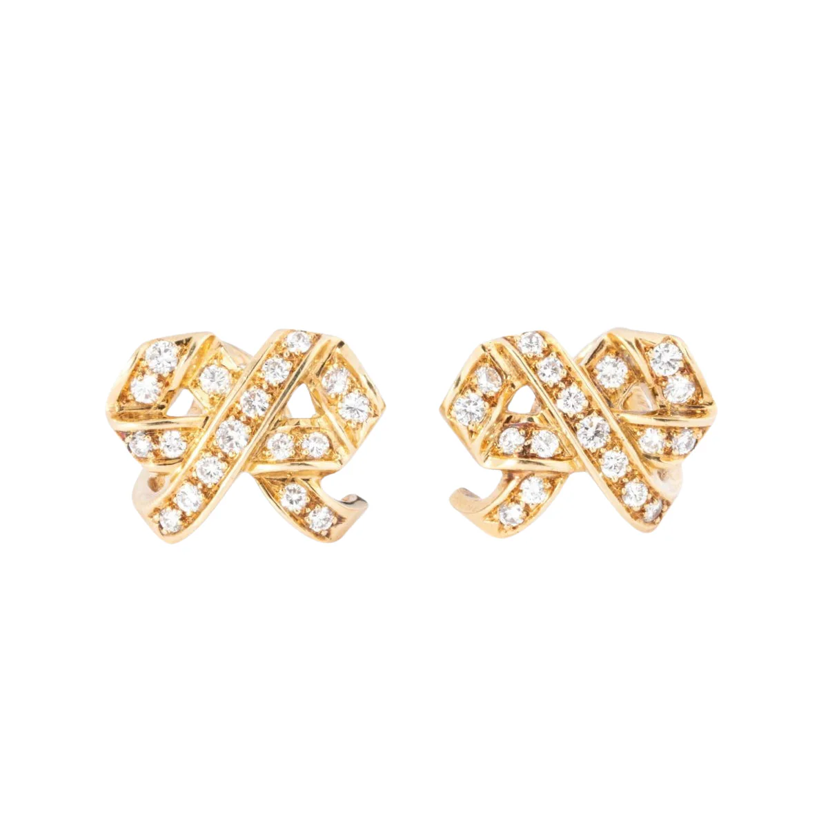 Boucles d'oreilles signée de la maison Dior en or jaune et diamant