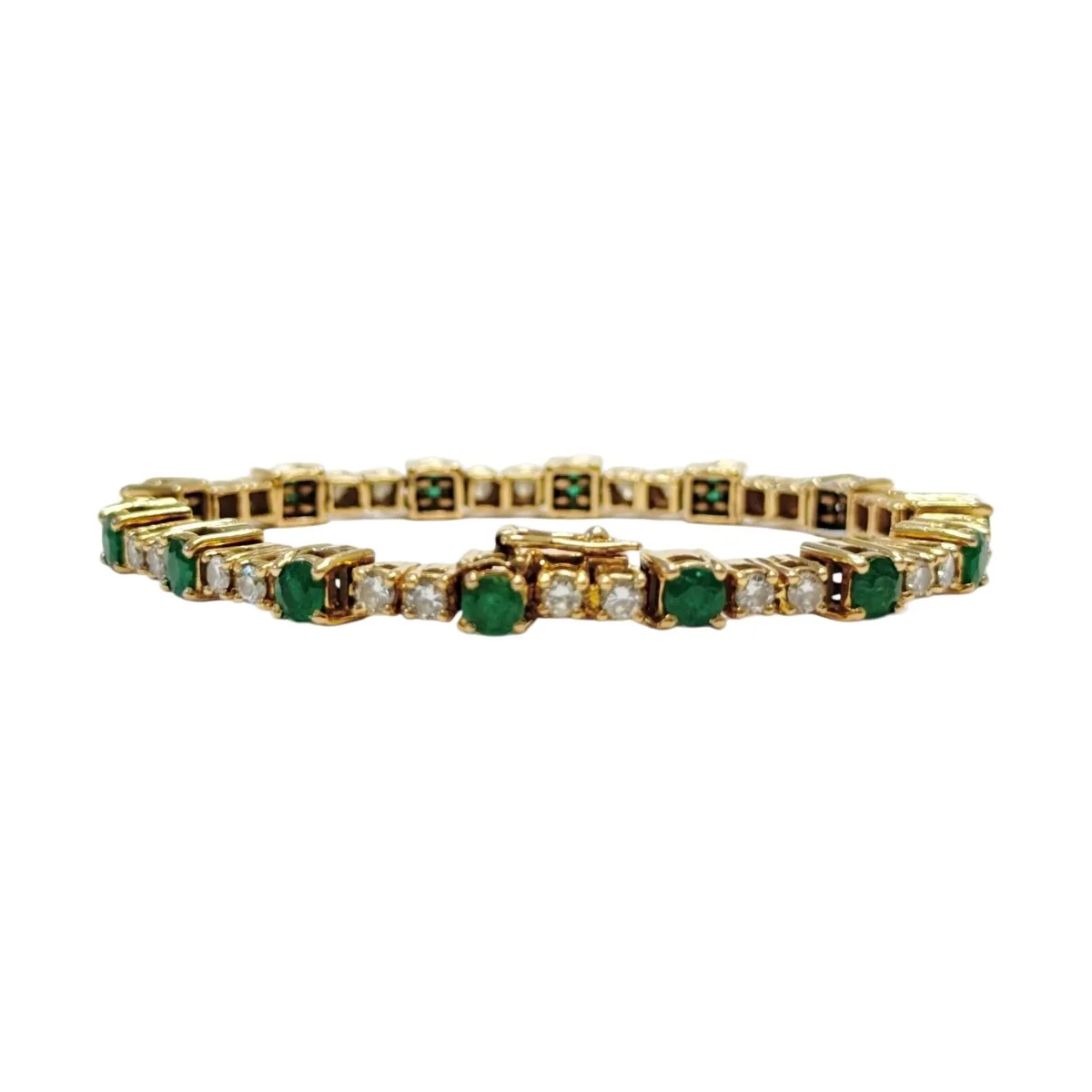 Bracelet Ligne en or jaune, émeraudes et diamants