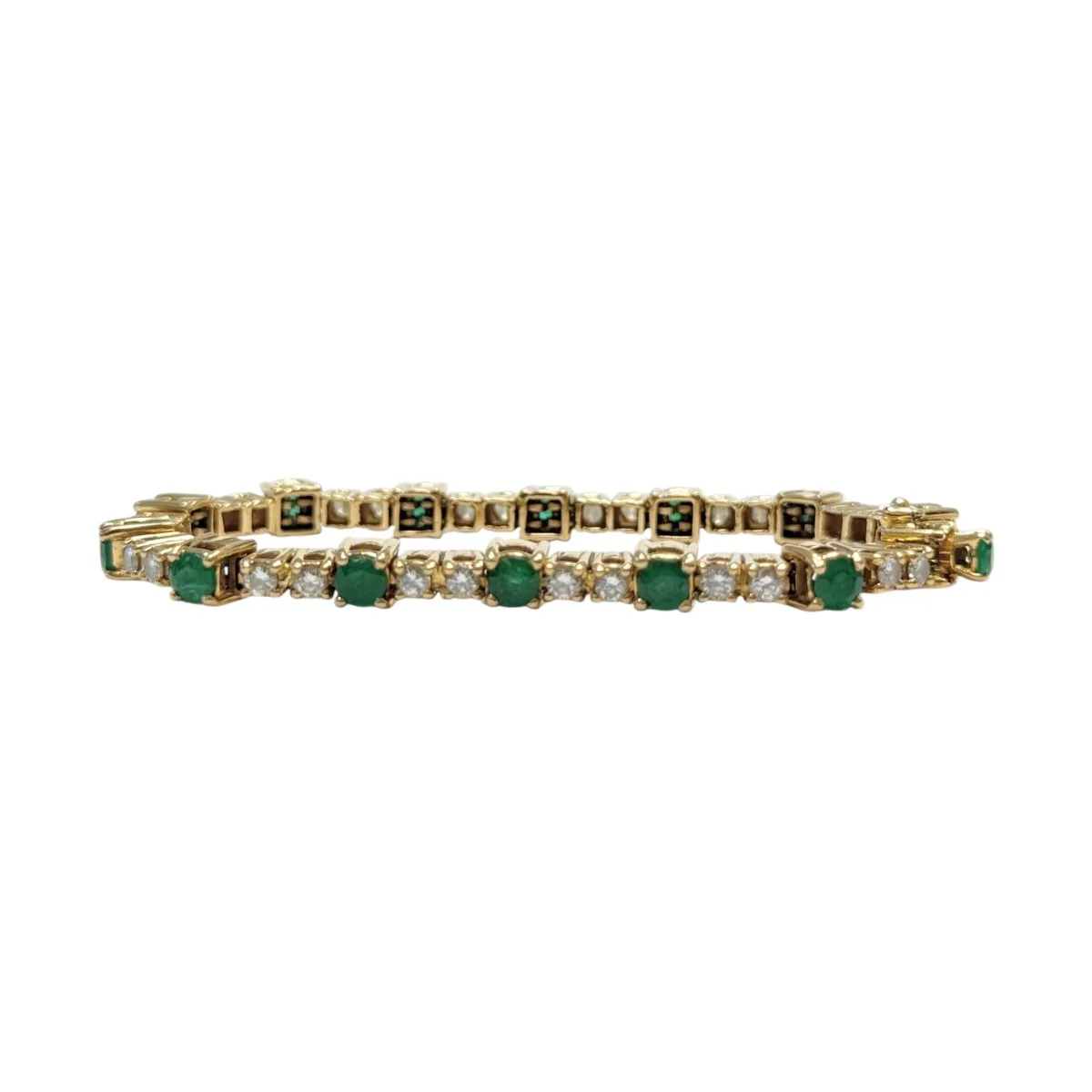 Bracelet Ligne en or jaune, émeraudes et diamants