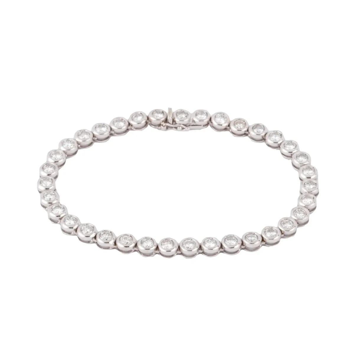Bracelet en or gris et diamants tennis serti tennis