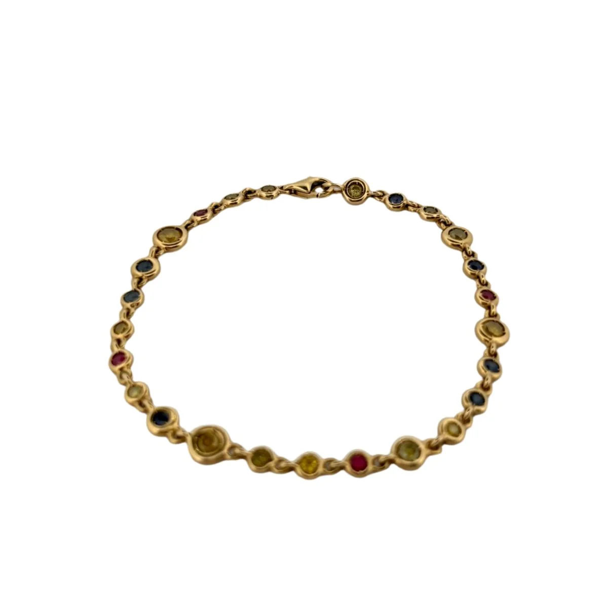 Bracelet Ligne en or jaune, saphirs et rubis