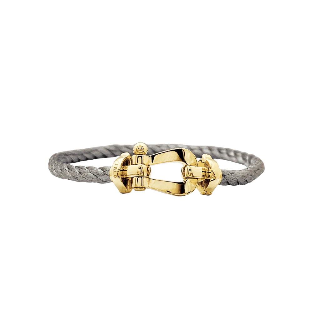 Bracelet Souple FRED "Force 10" en or jaune et acier