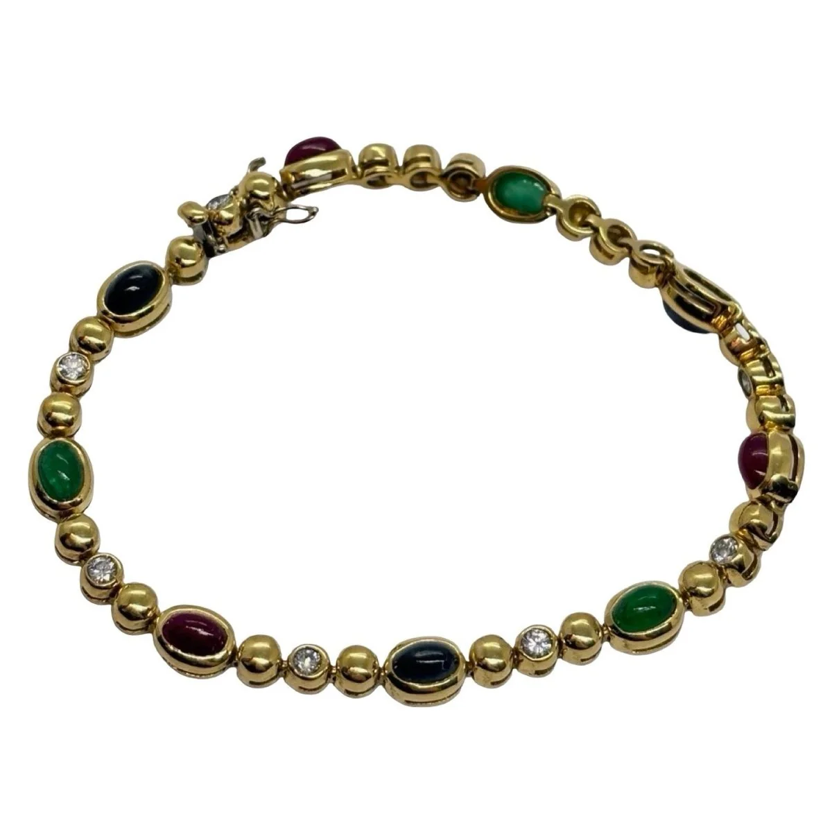 Bracelet Ligne en or jaune, saphirs, émeraudes, rubis et diamants
