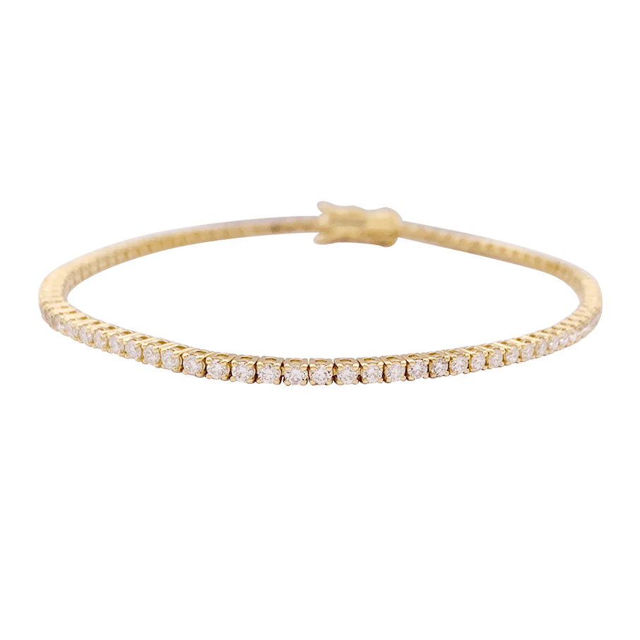 Bracelet ligne tennis or jaune, diamants.