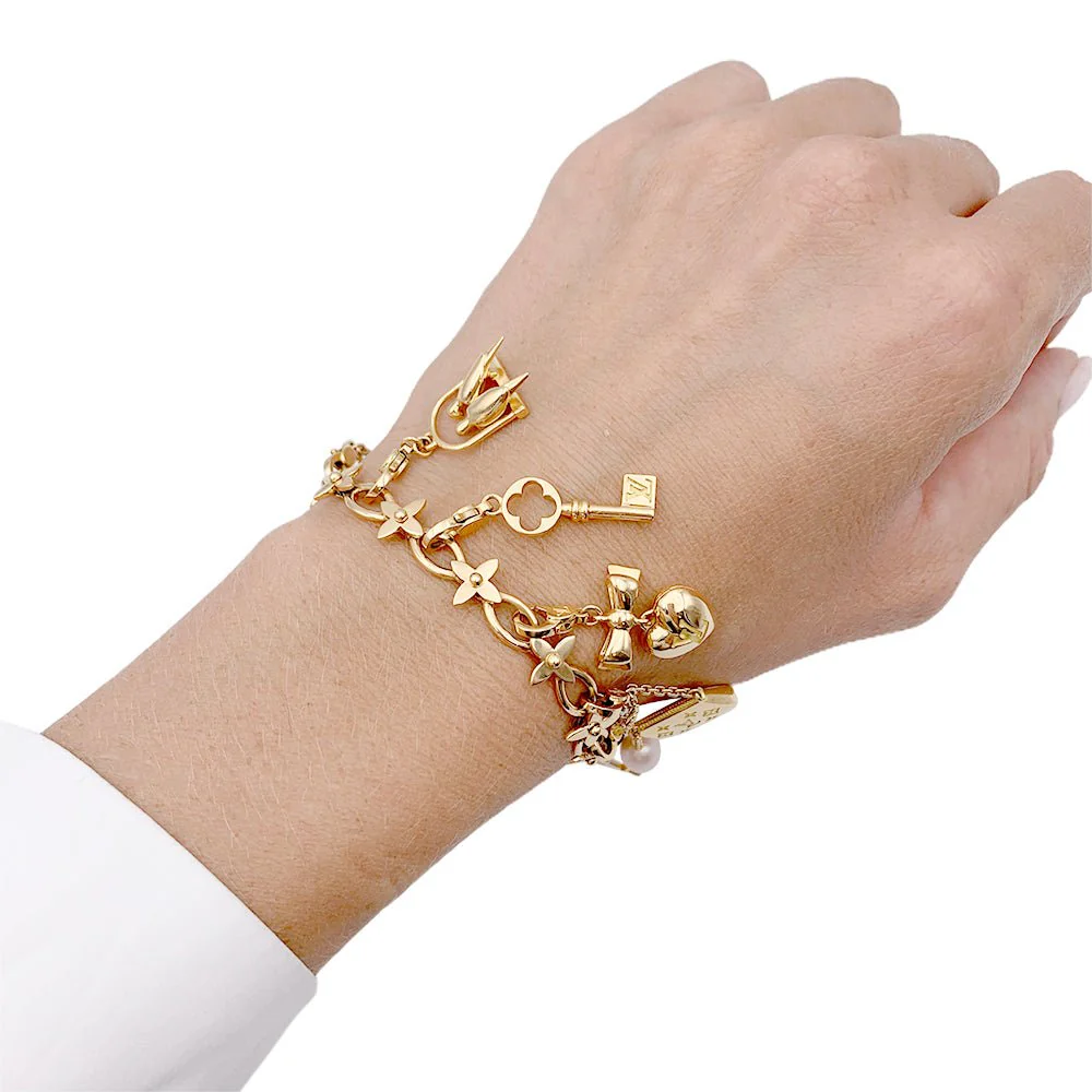 Bracelet Louis Vuitton, "Idylle",  breloques, or jaune, or blanc, perles. - Image 2