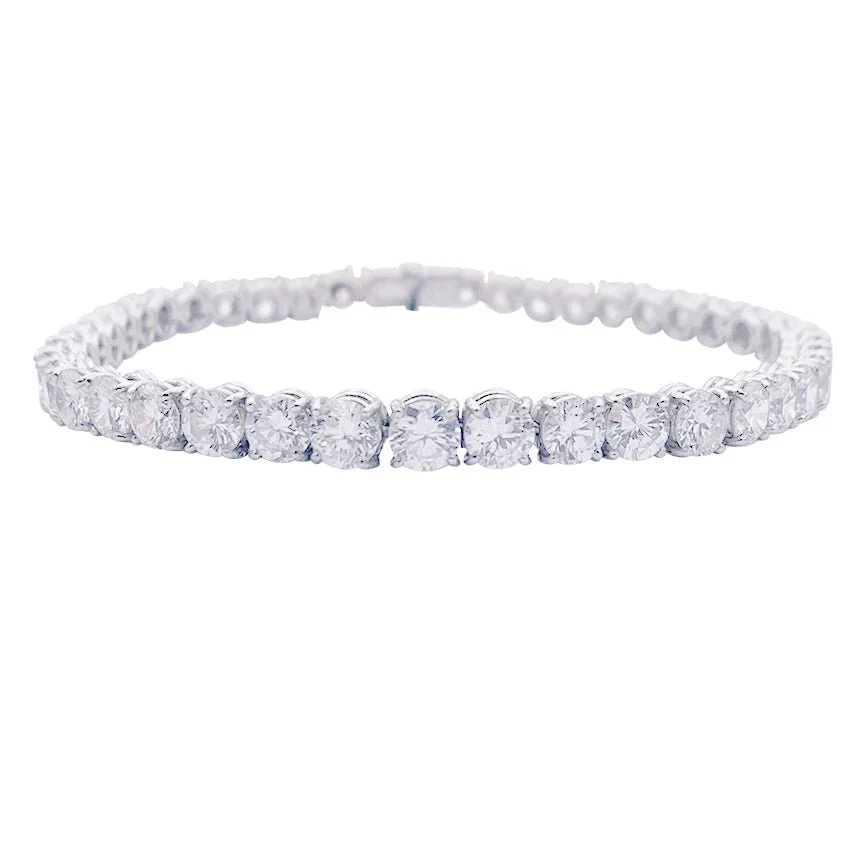 Bracelet or blanc et diamants.