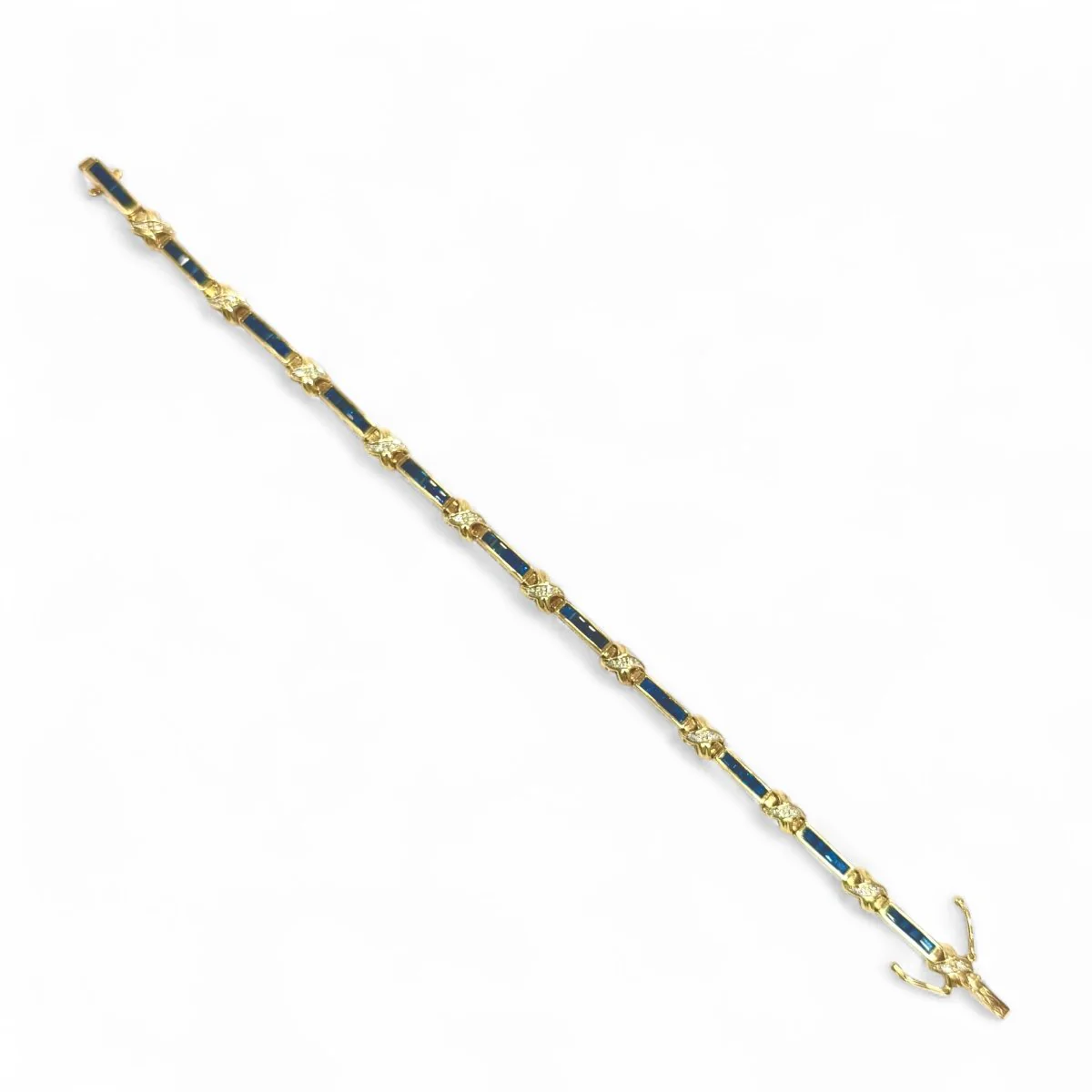 Bracelet souple en or jaune, saphirs et diamants
