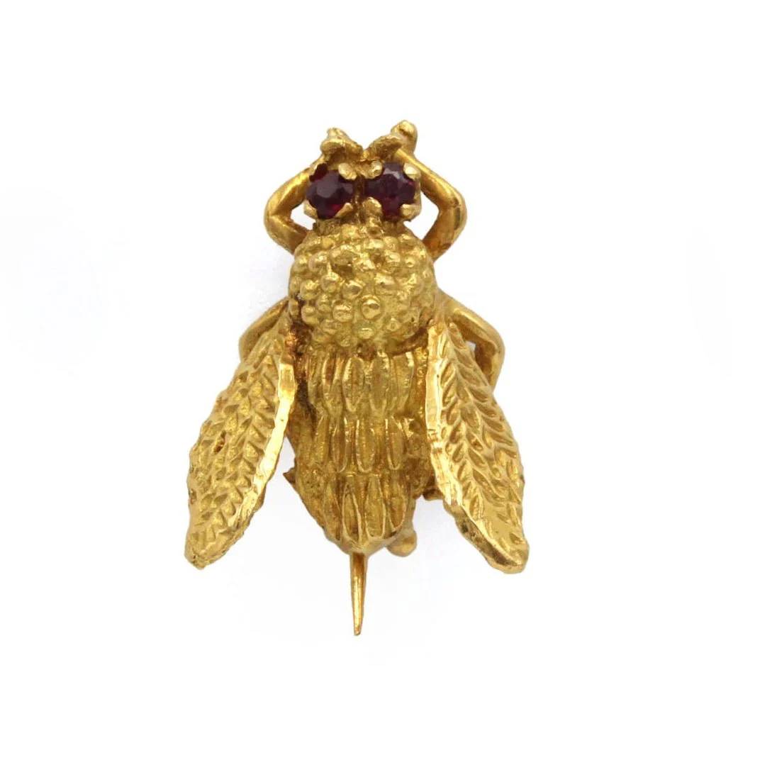 Broche Épingle en or jaune et rubis