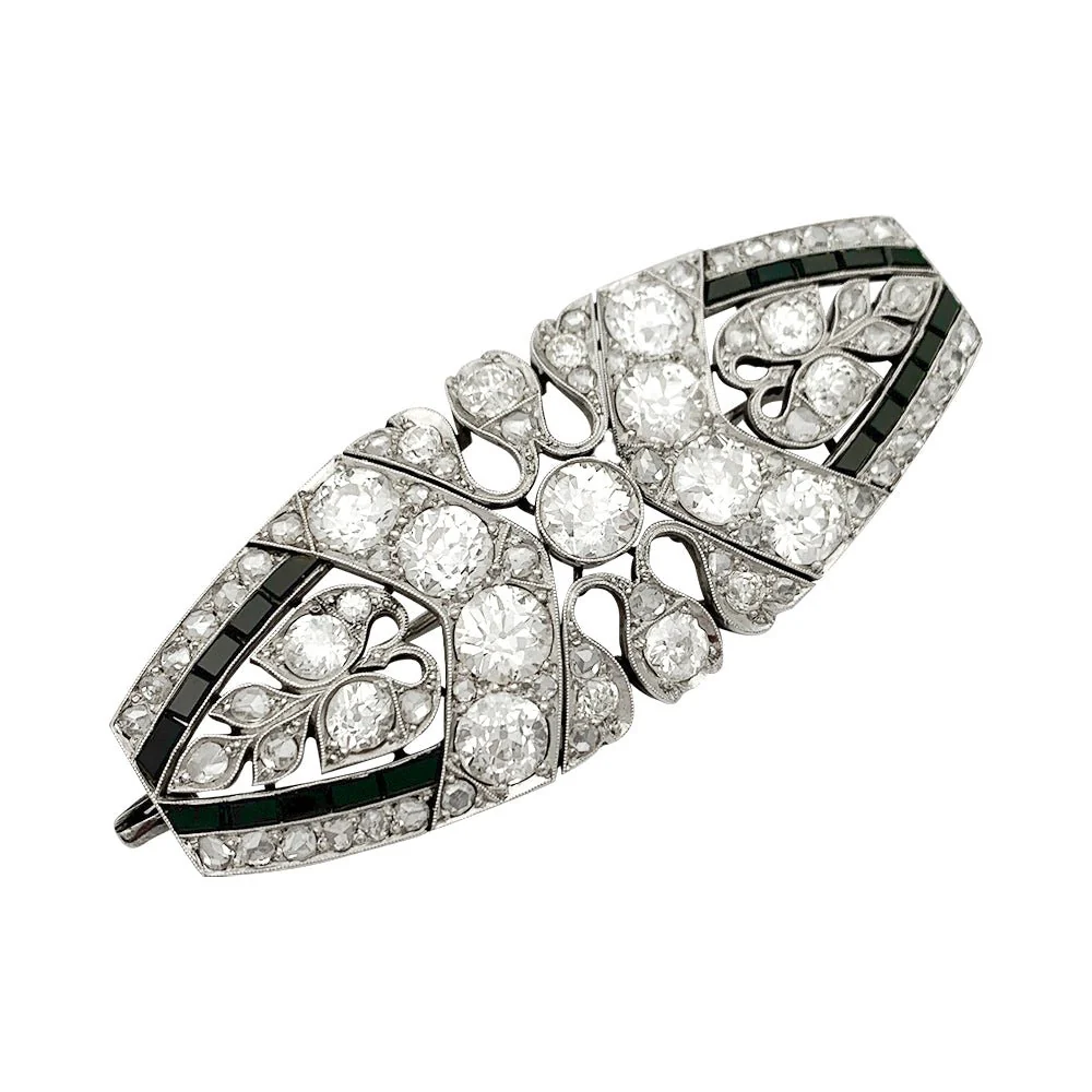 Broche Art Déco en platine sertie de diamants et d'onyx
