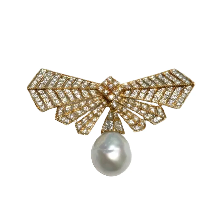 Broche Épingle en or jaune, perle et diamants