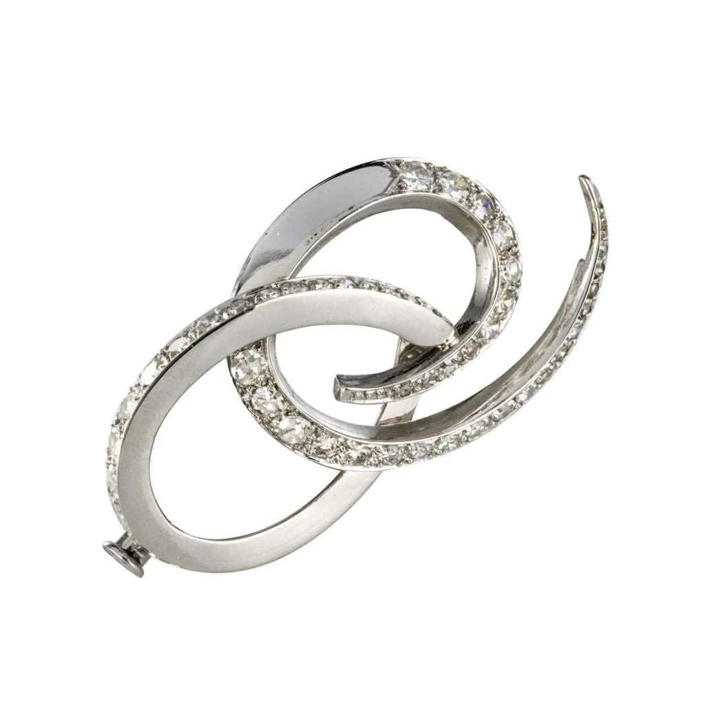 Broche en or blanc et diamants