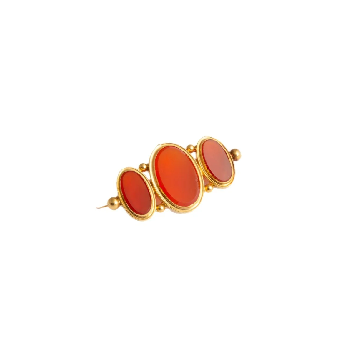 Broche en or jaune et cornalines