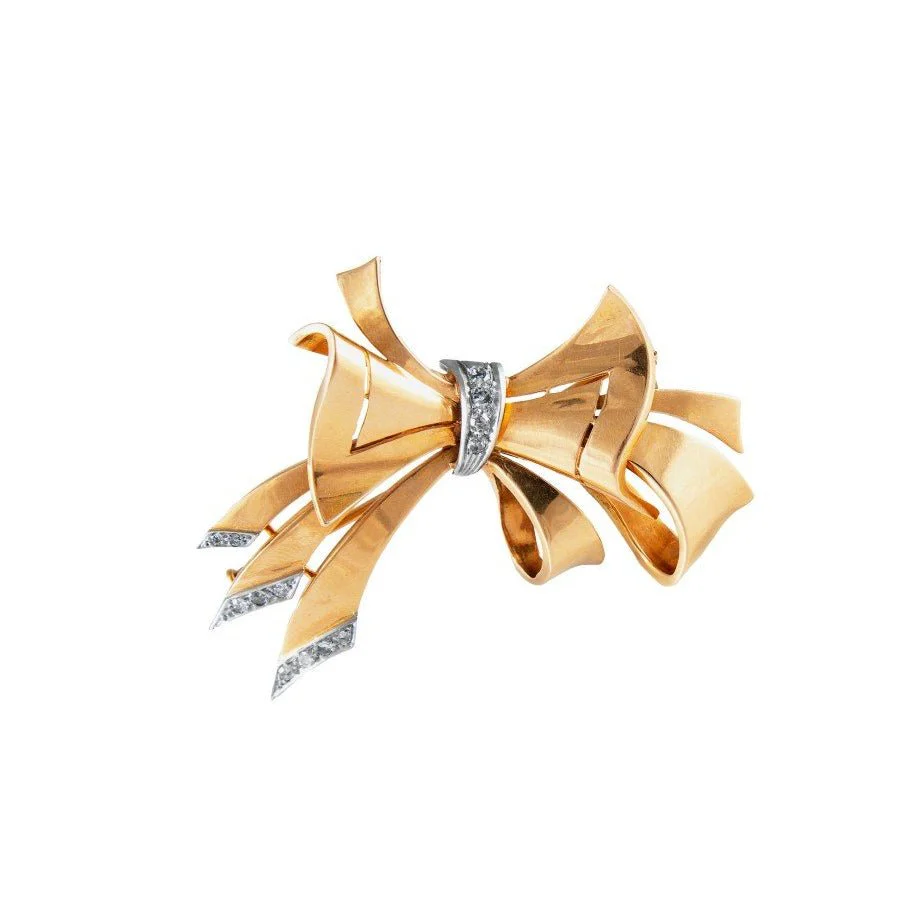 Broche Épingle Noeud en or jaune, platine et diamants
