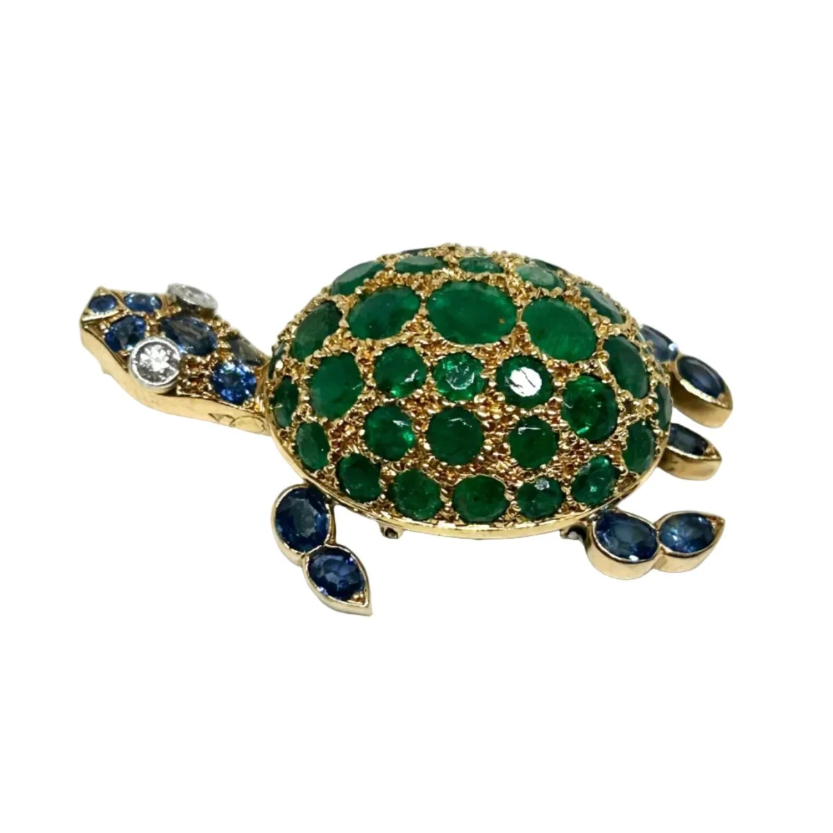 Broche GUBELIN en or jaune, émeraudes, saphirs et diamants