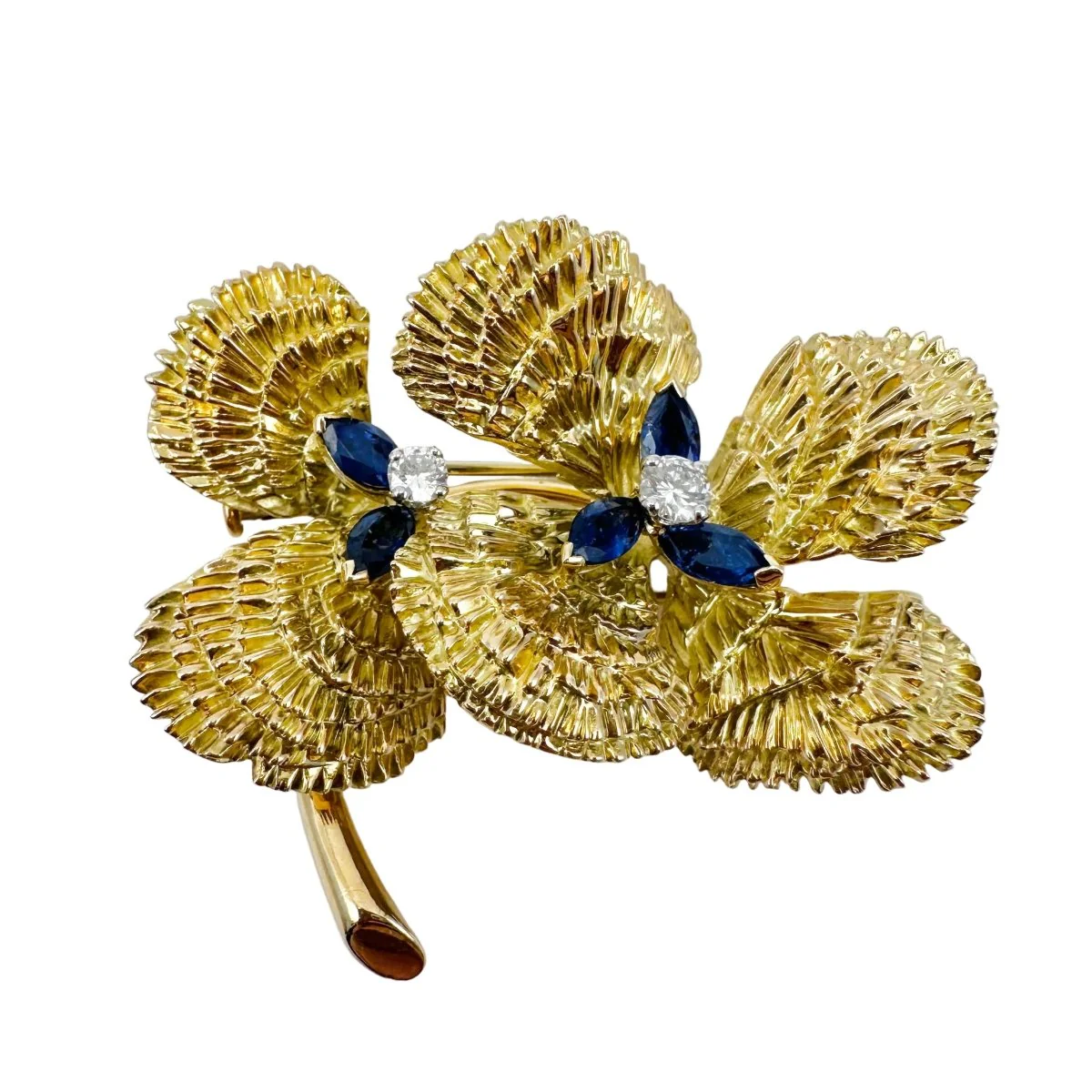 Broche MAUBOUSSIN "Deux fleurs" en or jaune, saphirs et diamant