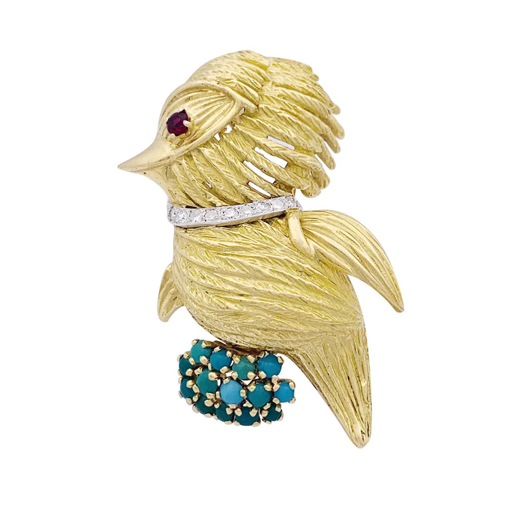 Broche Oiseau en or jaune, rubis, turquoises et diamants