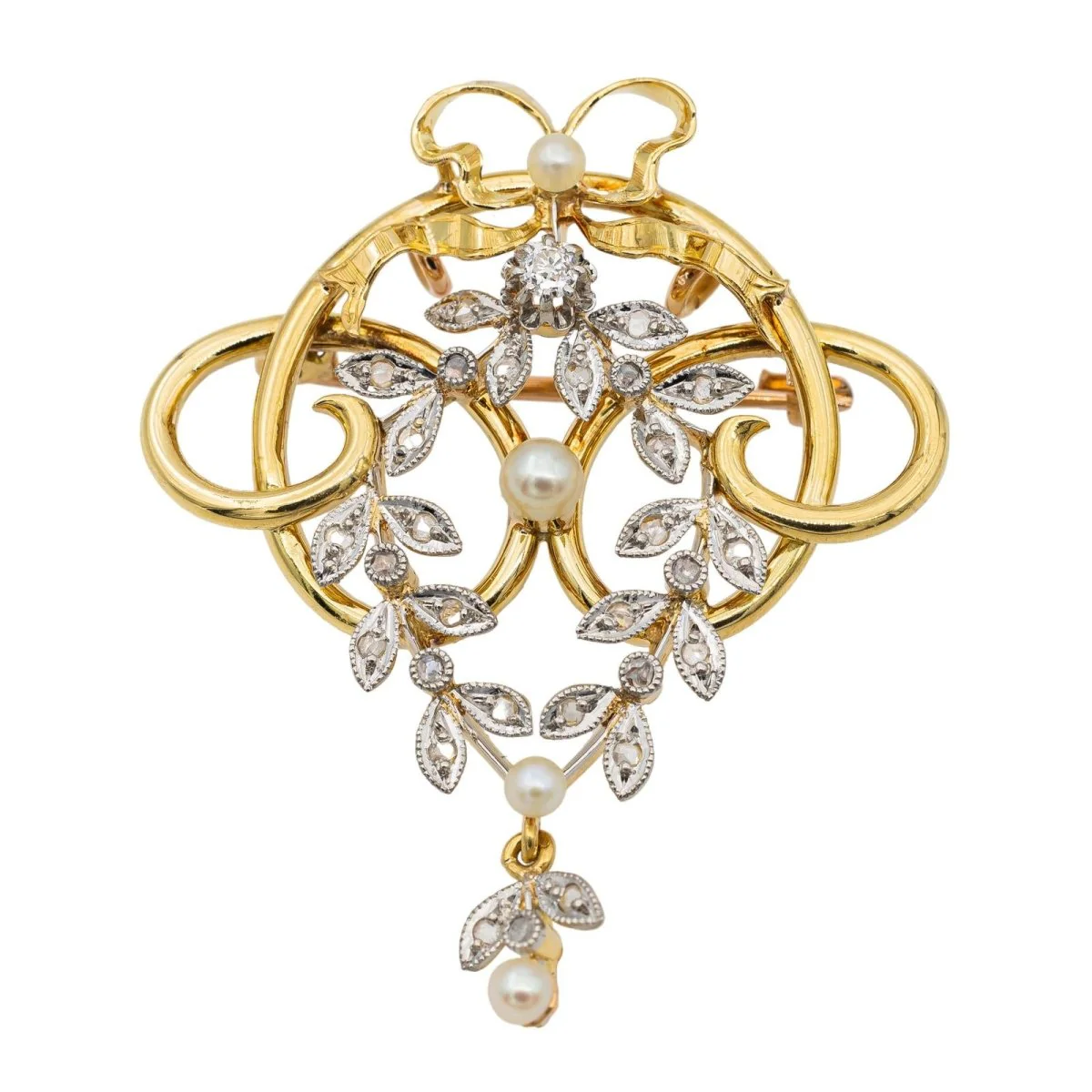 Broche en or jaune, or rose et perles