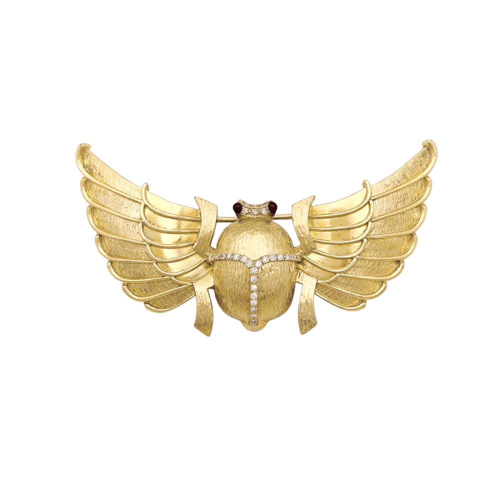 Broche Épingle en or jaune, rubis et diamants