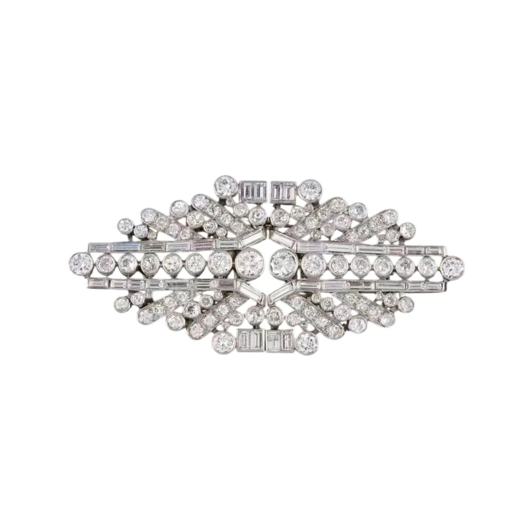 Broche Art Déco double clips en platine, or et diamants