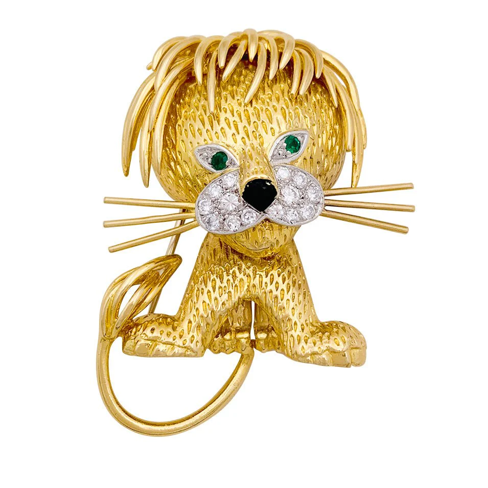 Broche Clip VAN CLEEF & ARPELS "Lion Ebouriffé" en or jaune, platine, émeraudes et diamants