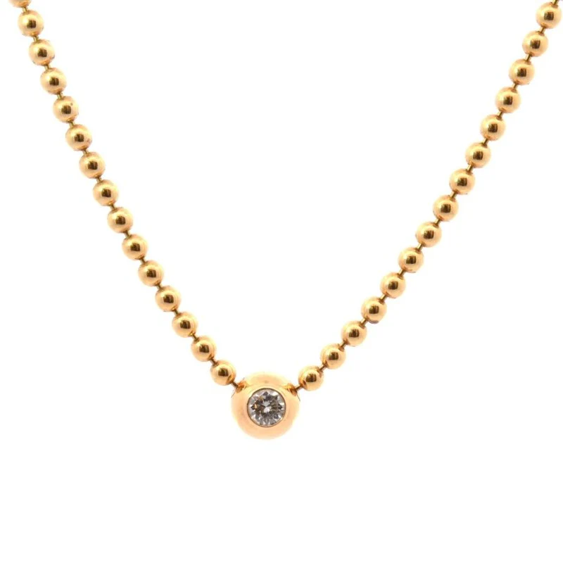 Collier CARTIER "Draperie" en or jaune et diamant