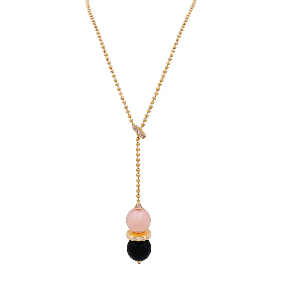 Collier Cravate CARTIER "Evasion Joaillière" en or rose, opale, onyx, saphir et diamants