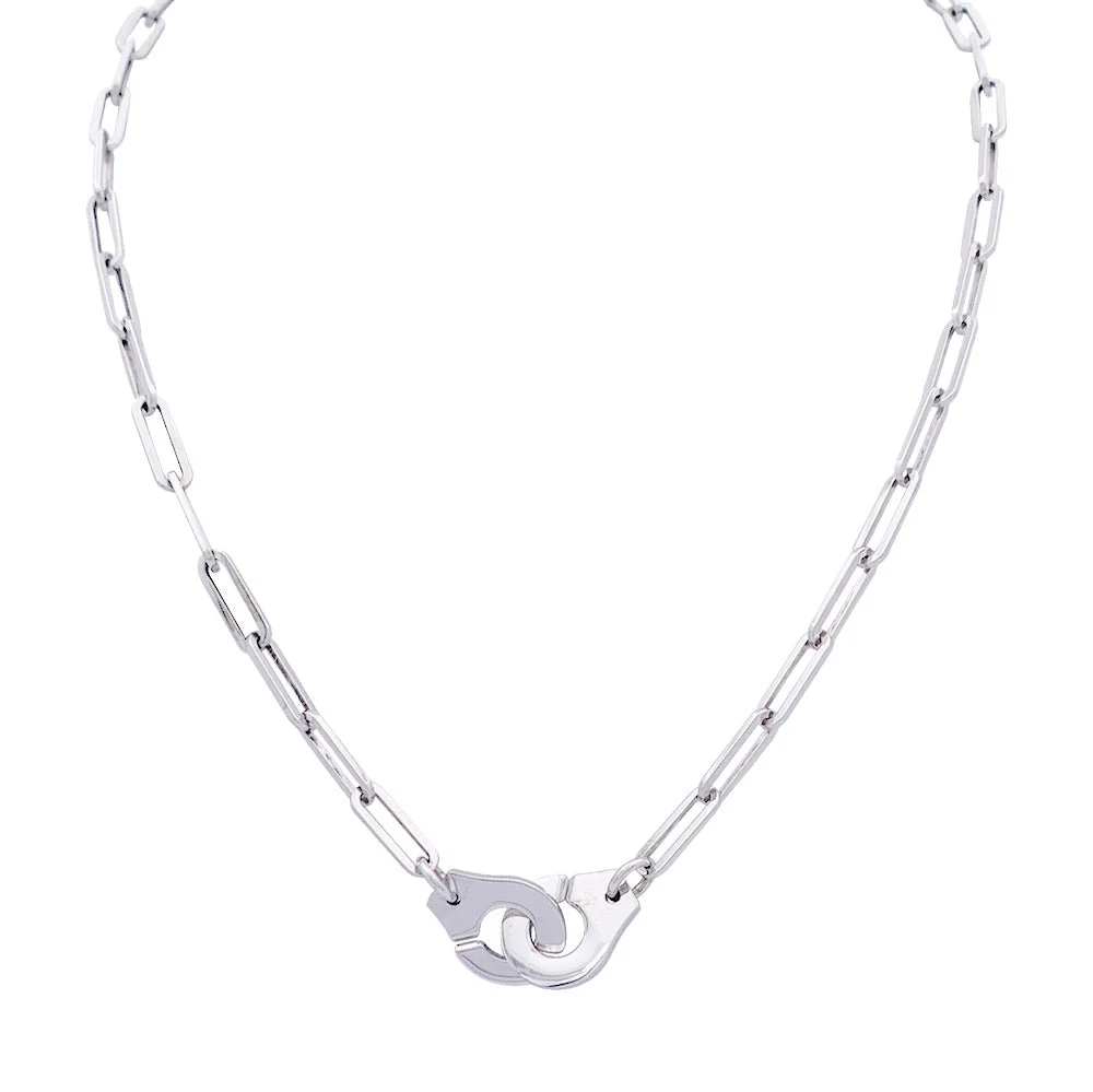 Collier Dinh Van, "Menottes R12", or blanc.