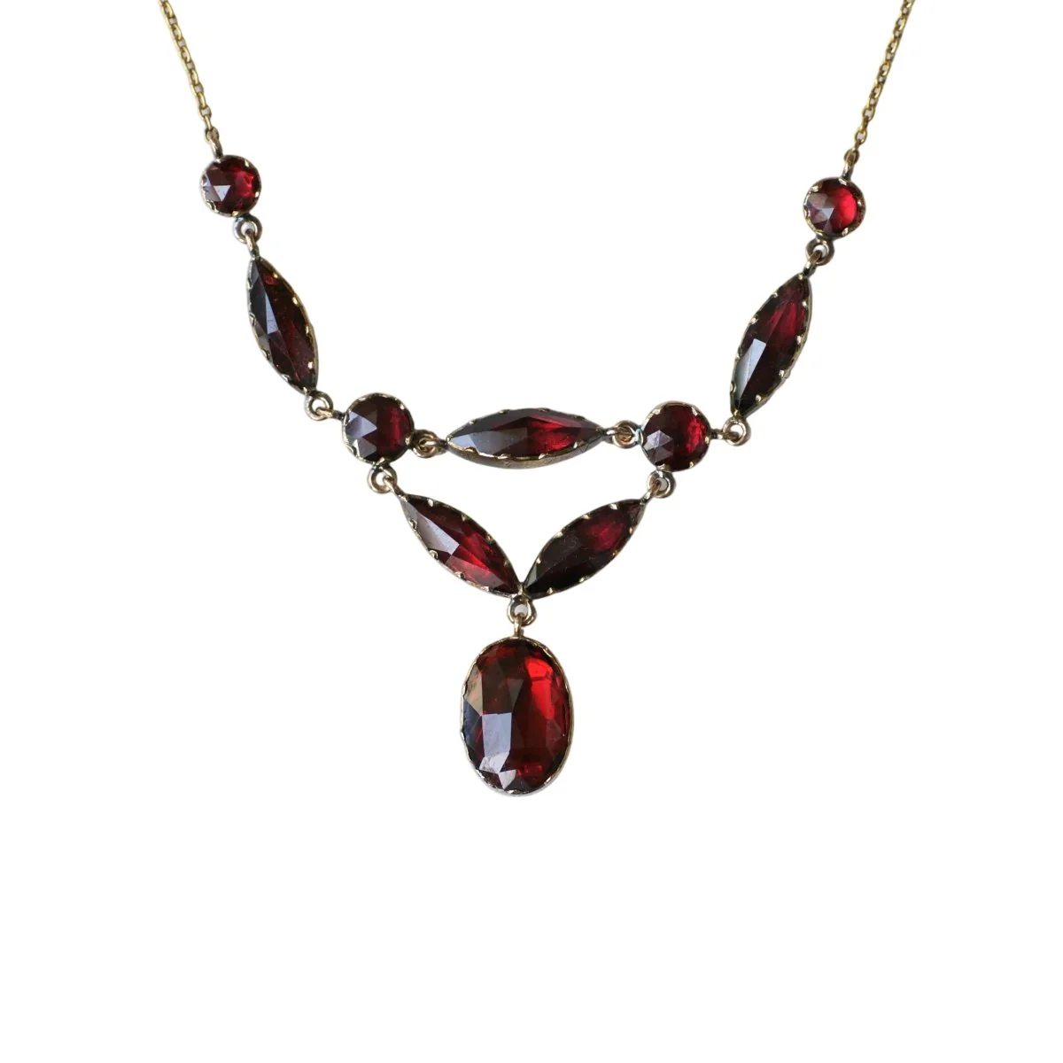 Collier Draperie en or jaune, or rose et grenats