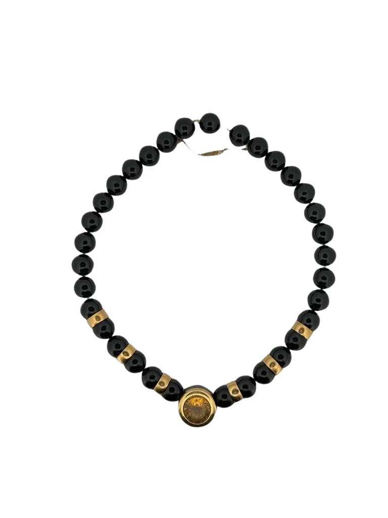 Collier en or jaune, perles d'onyx et citrine